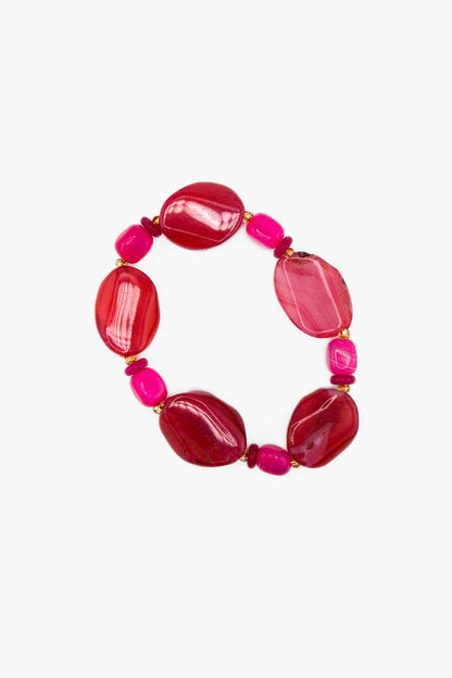 Bracelet Macaron Bourjeone en perles roses et framboise avec reflets dorés